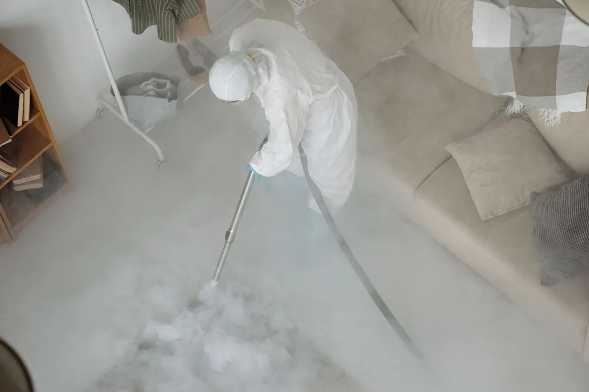 Biohazard cleanup technician in protective equipment, Blue Ridge, GA